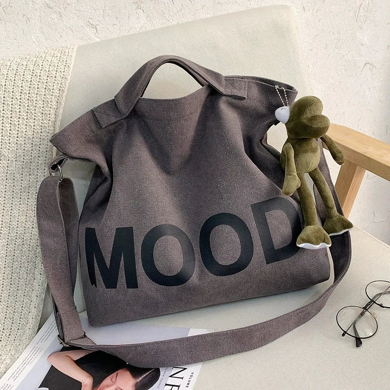 Letters solid color printing canvas large bag models tide  Unisex with the same canvas crossbody large capacity Tote bag